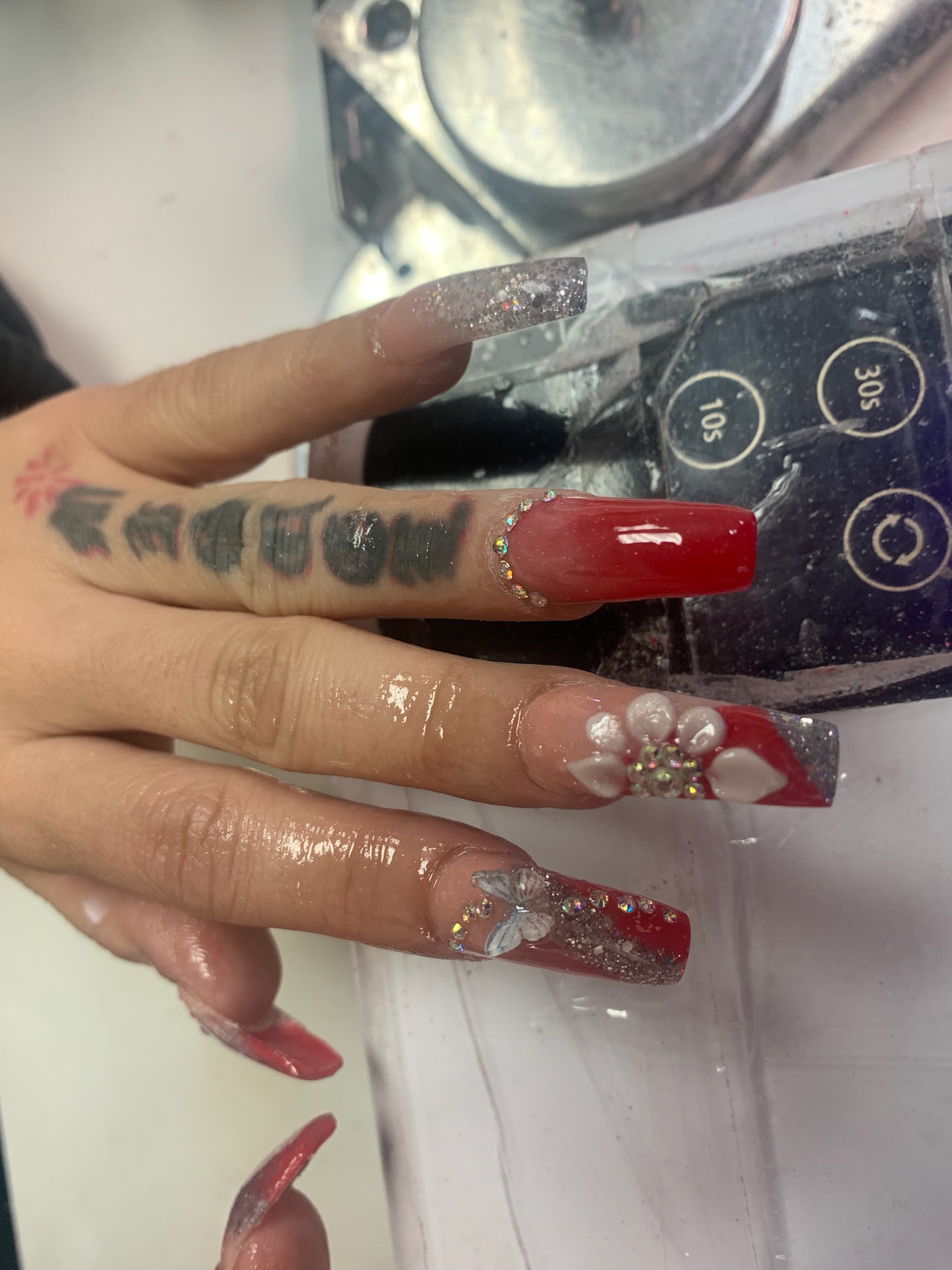 Red coffin nails with 3D white flowers and crystals